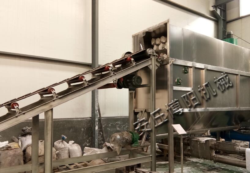 石灰石粉自動拆包機是怎么達到無塵拆袋作業(yè)的？